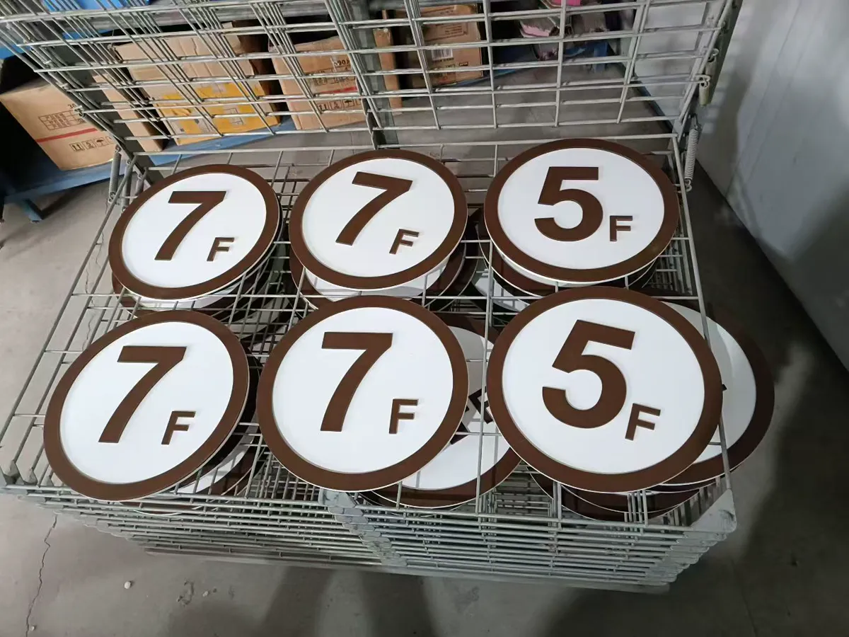 Set of round dimensional floor markers arranged during production
