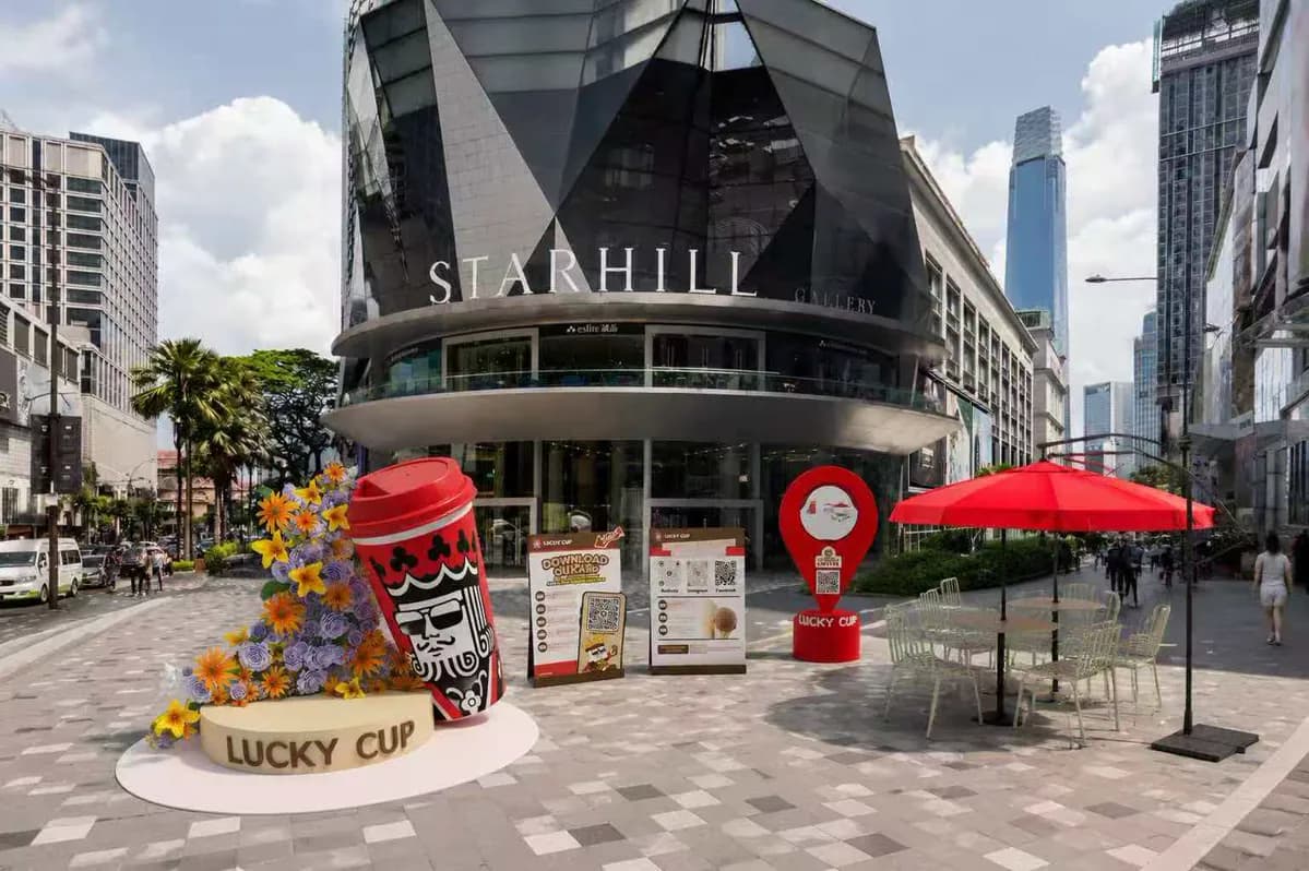 Lucky Cup street activation with branded cart, parasols and freestanding signs